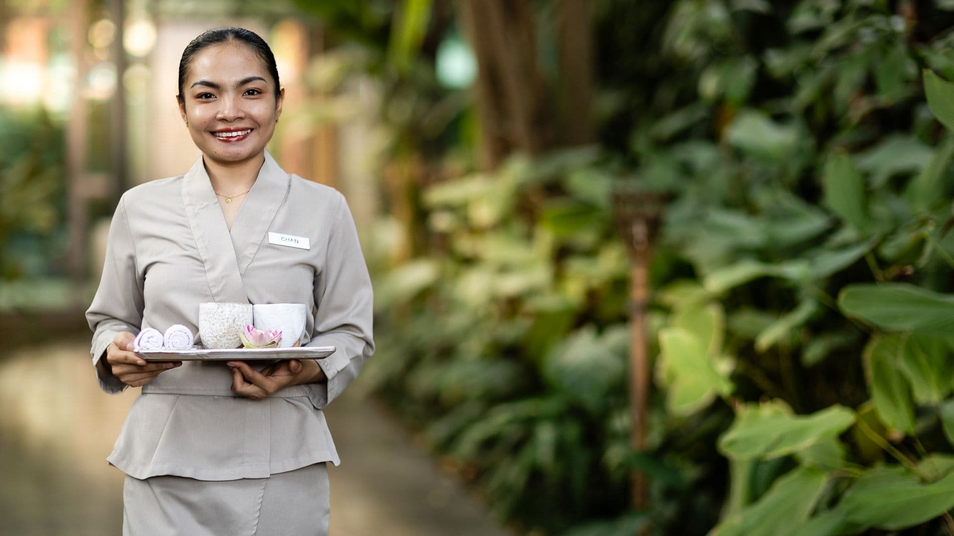 Anjali by Syphon hospitality staff holding welcome drinks