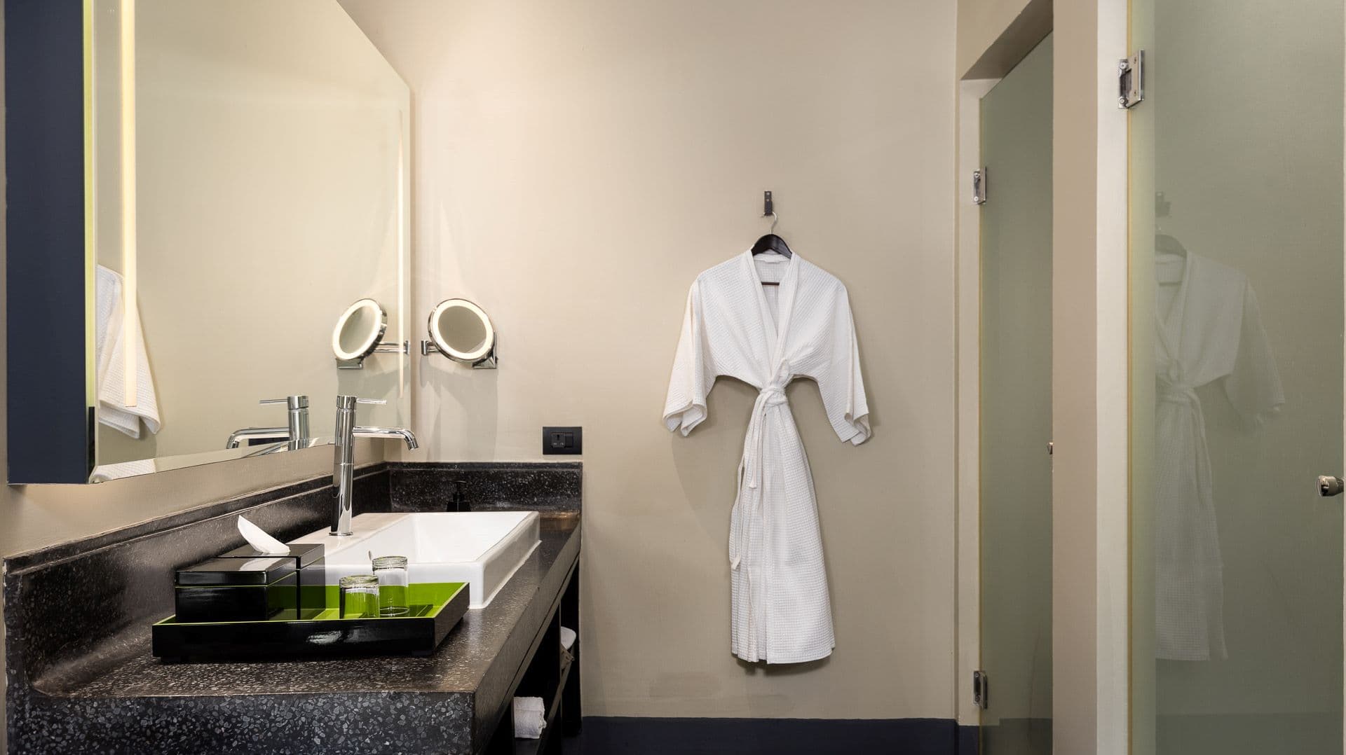 Anjali by Syphon rooftop junior suite bathroom with a piece of robe