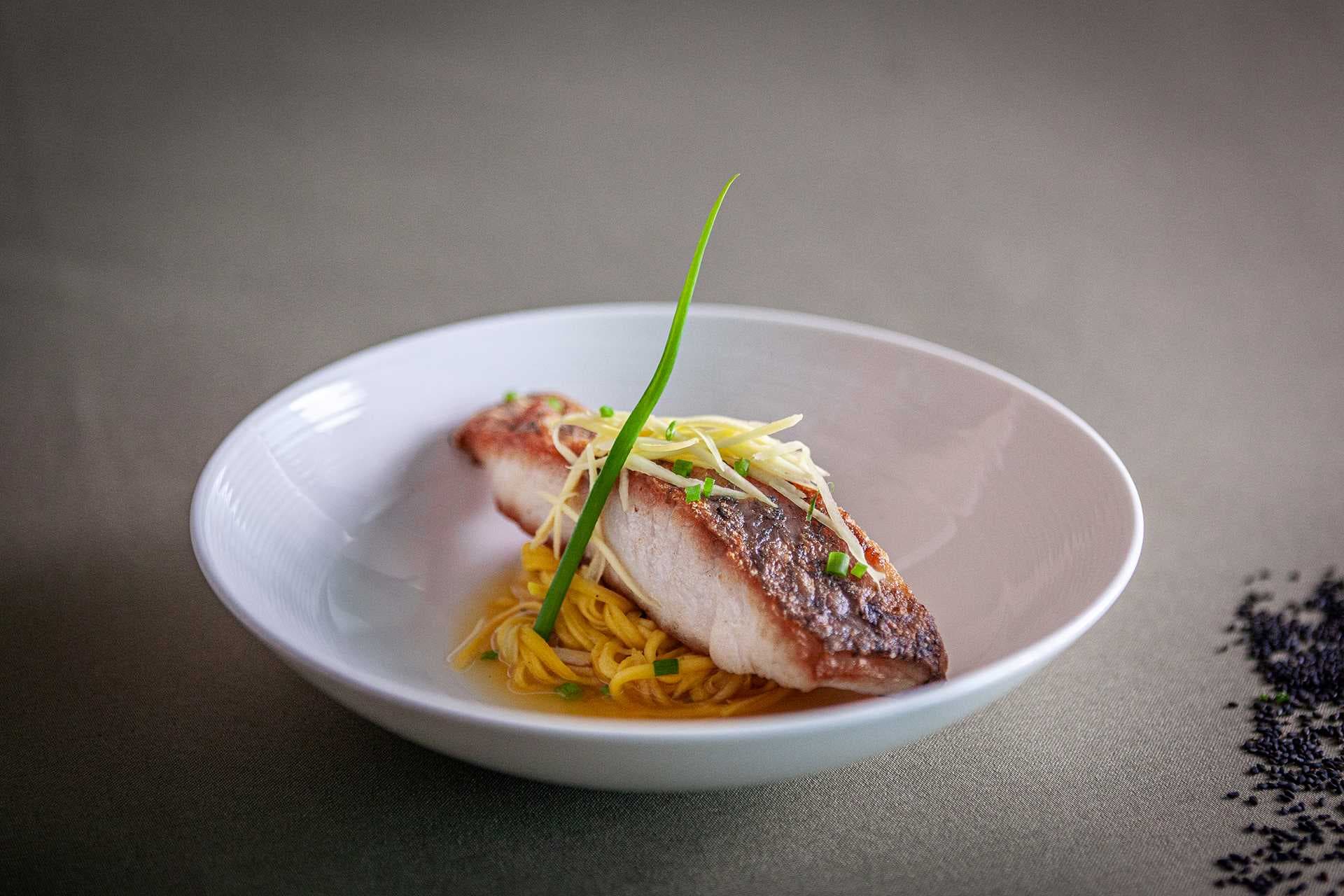 Mekhala Bar and Restaurant roastedseabass on green mango